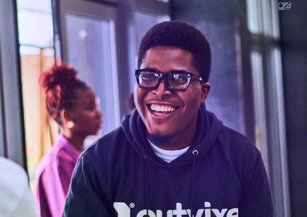 Ulu Oluebubechukwu smiling at a creative event